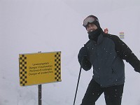  Robert poses by the avalanche warning sign