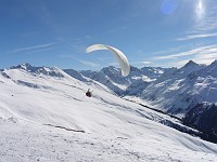  Paragliders over the alps